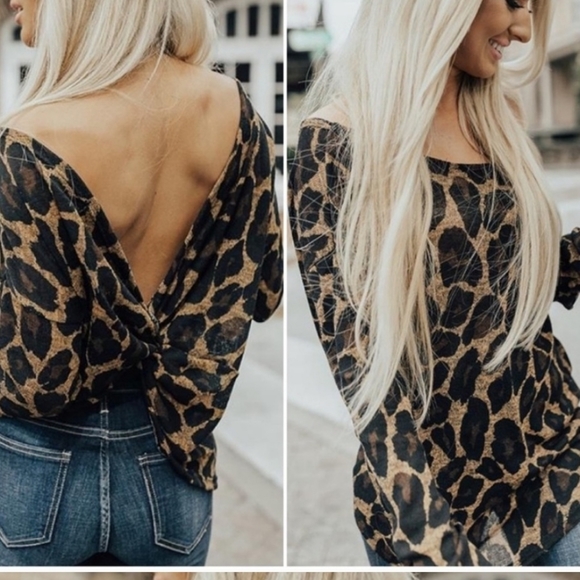 Infinity Raine Tops - Leopard Print twist back top..sz m